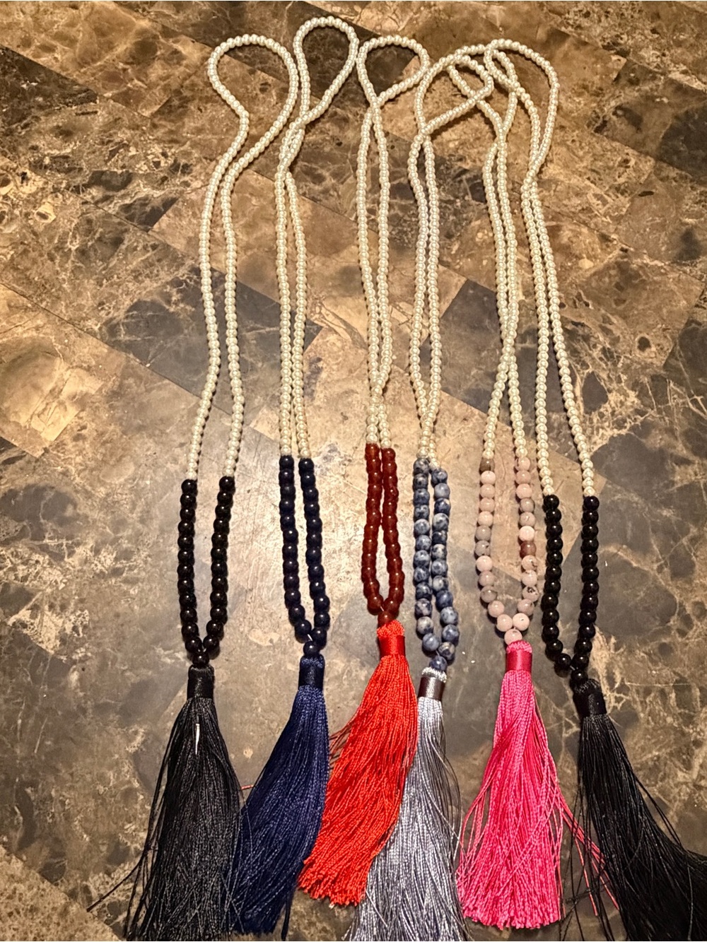 Gemstone and plastic beaded tassel necklaces